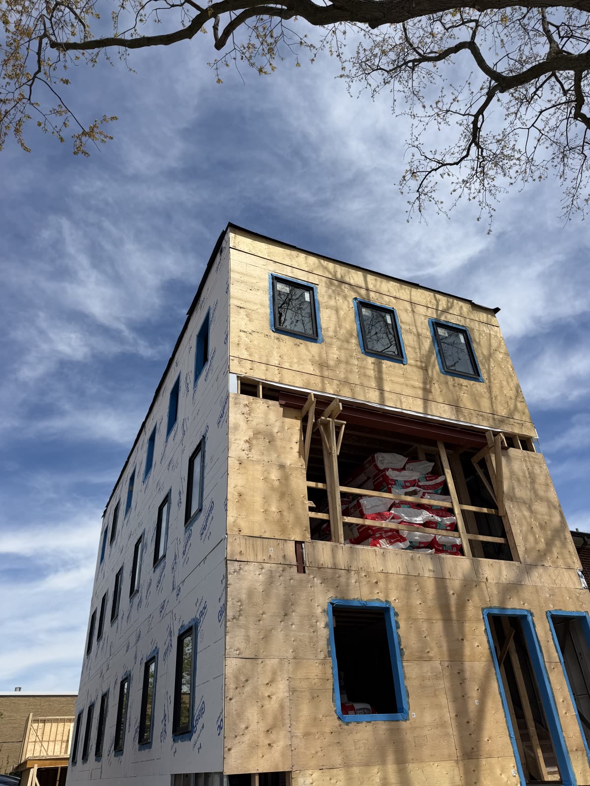Completed Framing — Units are framed and windows are being installed.